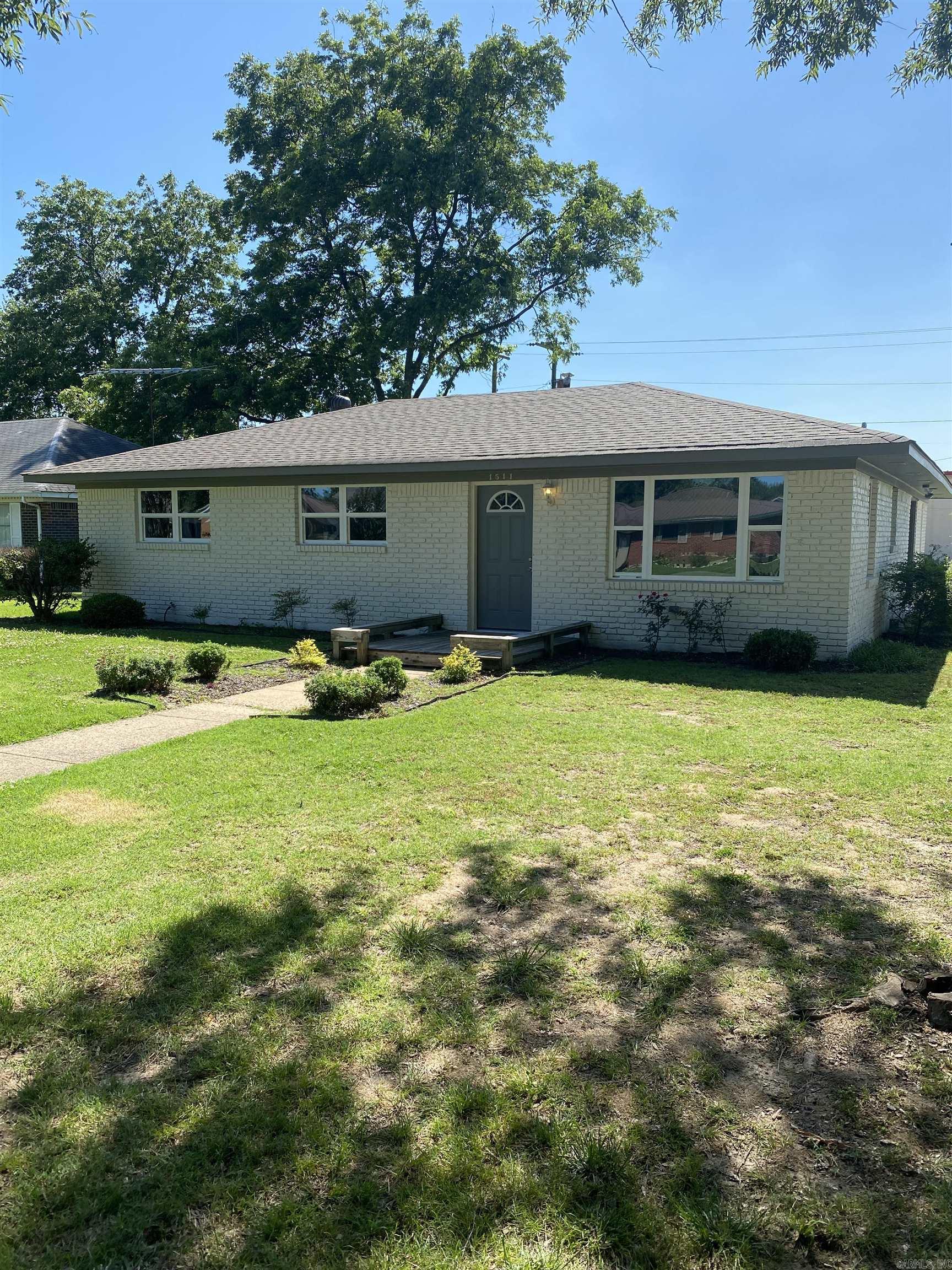 This newly remodeled 3 bedroom, 2 bathroom brick home has a nice addition on the back and has been updated with new paint, flooring, baths and updated kitchen, new windows and new roof.