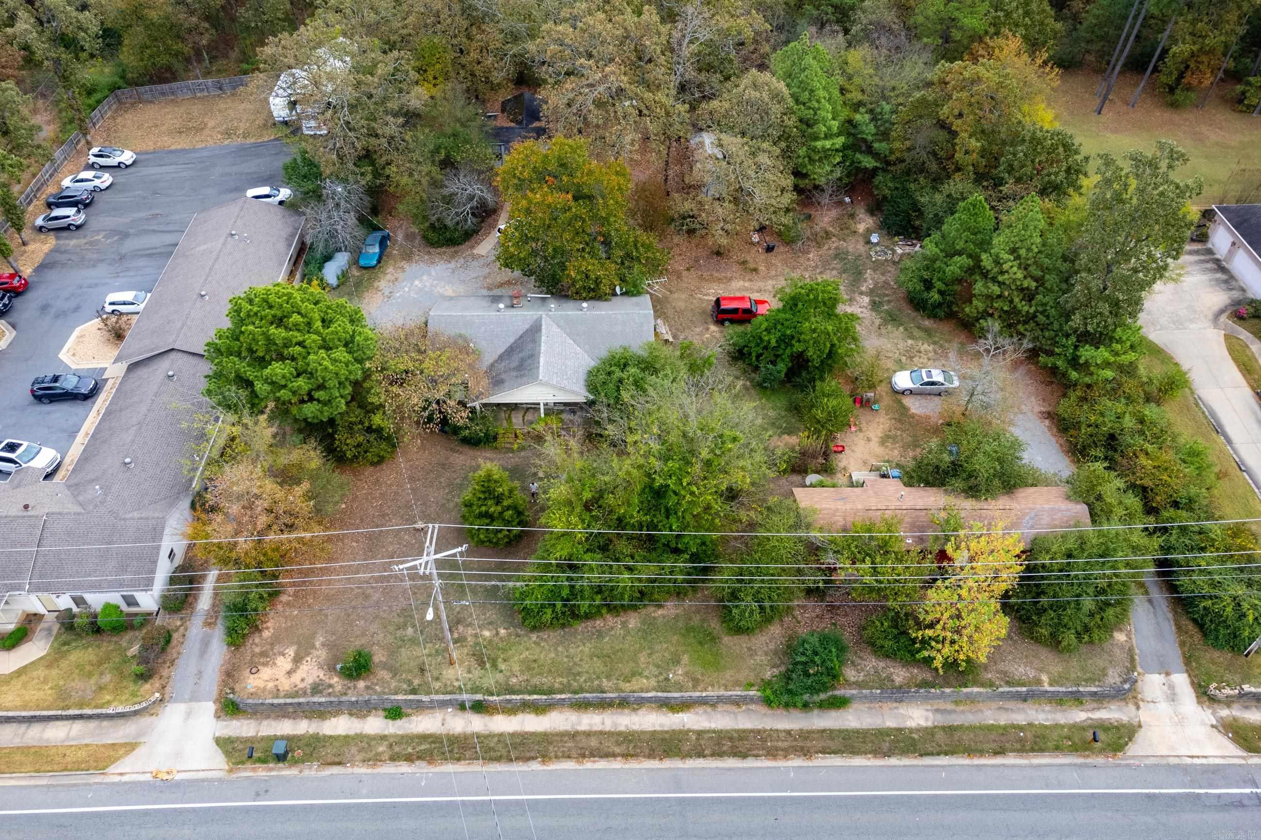 Prime Commercial Opportunity - Fantastic development opportunity in the heart of West Little Rock! This 1.80-acre lot offers exceptional visibility and traffic along Taylor Loop Road, making it a prime location for commercial use. Surrounded by thriving businesses and new developments, the property is flat, private, and wooded, offering both accessibility and natural appeal. Currently, three dwellings occupy the lot, all owner-occupied, providing immediate rental potential or a clear path to redevelopment. This site is ideal for retail, office, medical, or mixed-use projects. High-traffic location, Surrounded by commercial properties, Flat and build-ready land, Great investment in a growing area. Donāt miss this rare chance to secure versatile land in a booming area of Little Rock!