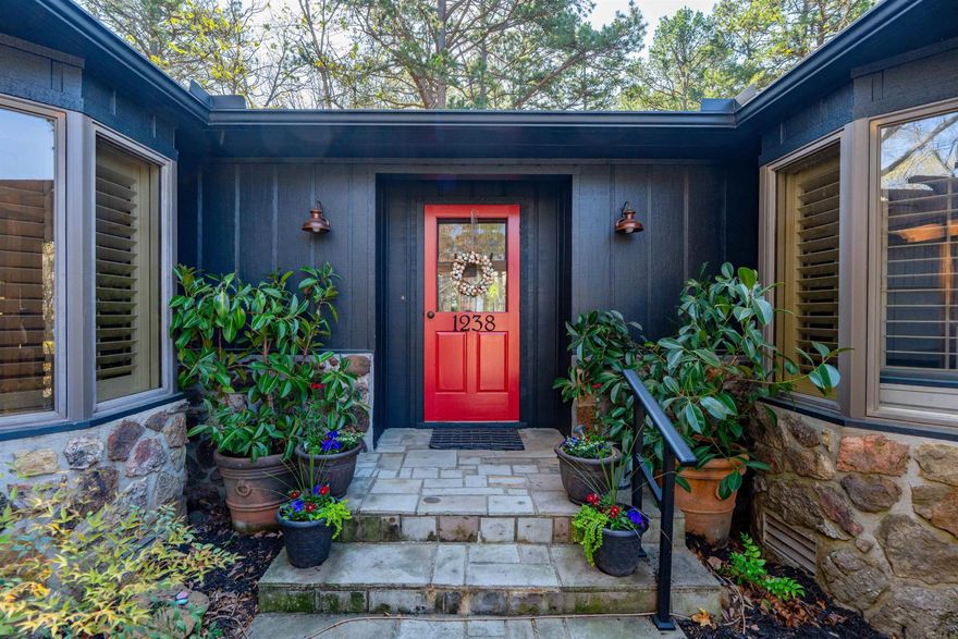 This beautiful home is a gem! Located in a Heber Springs neighborhood close to Greers Ferry Lake and sits on 4 lots in town!  The home is a 2,930 sq ft, 3-bedroom, 3.5-bath with a master suite that includes a dedicated office space. Two fireplaces and hardwood floors throughout the house add to it's charm. The layout provides a balance of open and private areas, making it suitable for a family or hosting guests.  The main living areas offer ample space for everyday living and entertaining, with a functional flow between the kitchen, dining, and living spaces. Rich in charm and character, this home showcases distinctive features and a welcoming atmosphere.  The property’s location provides easy access to Greers Ferry Lake, offering opportunities for boating, fishing, and outdoor recreation. Just minutes from Sandy Beach and the school. Whether used as a primary residence or a secondary home, this property offers a practical layout and a desirable location near the lake.