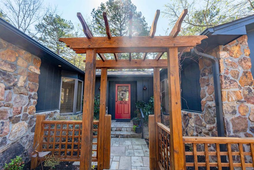 This beautiful home is a gem! Located in a Heber Springs neighborhood close to Greers Ferry Lake and sits on 4 lots in town!  The home is a 2,930 sq ft, 3-bedroom, 3.5-bath with a master suite that includes a dedicated office space. Two fireplaces and hardwood floors throughout the house add to it's charm. The layout provides a balance of open and private areas, making it suitable for a family or hosting guests.  The main living areas offer ample space for everyday living and entertaining, with a functional flow between the kitchen, dining, and living spaces. Rich in charm and character, this home showcases distinctive features and a welcoming atmosphere.  The property’s location provides easy access to Greers Ferry Lake, offering opportunities for boating, fishing, and outdoor recreation. Just minutes from Sandy Beach and the school. Whether used as a primary residence or a secondary home, this property offers a practical layout and a desirable location near the lake.