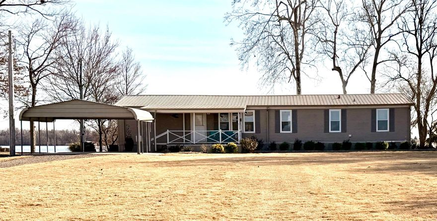 AMAZING Lakefront property!! This immaculate 3 bed, 2 bath double wide mobile home has been completely renovated and beautifully designed to perfection! Entertain friends and family in this open concept floor plan and enjoy all that Lake Chicot has to offer! Experience breathtaking views from the front porch, screened in back porch, or recently repaired dock. Inside you will find high quality luxury vinyl flooring, shiplap ceilings, completely renovated bathrooms, all new lighting and fans, new windows and finished sheetrock throughout. Additional improvements include installation of new HVAC system and ductwork, updated electrical outlets, additional insulation, gutters installed with leaf guard, repaired water lines, reinforced footings, and additional gravel added to driveway. Also, the dock has been scabbed with reinforced sides, and the seawall has been re-bagged. This property is move-in ready as it has been designed with care and attention to every detail! Contact Kara Beth at 870-501-2500 to see 269 Lakehall Rd for yourself!