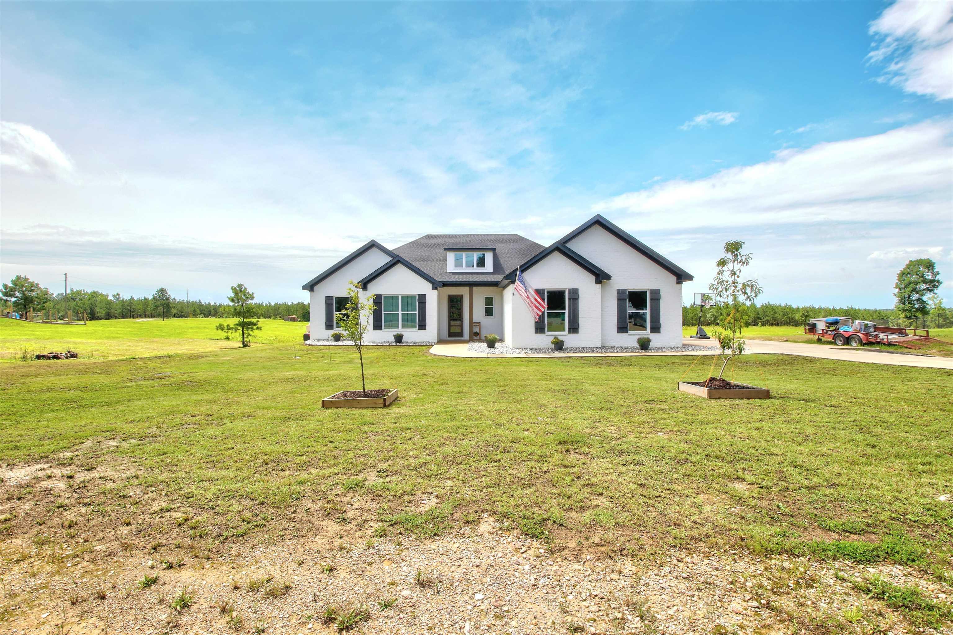 Stunning home built at the end of 2022. This beauty has endless space and storage, offering tons of custom features and a fantastic view! With 2150 sq ft, 4 bedrooms w/2 baths, open kitchen with large island for lots of entertaining and seating. Don't miss out on the rock fireplace, wooden beams in the living room and a huge, spacious pantry. Large primary suite has beams, on suite w/walk in shower and closet. Great home with tons of extras, Sitting on nearly 2 acres, including some beautiful wildlife to watch from the comforts of your own home. Schedule your clients tour NOW, Don't miss out on this one!!