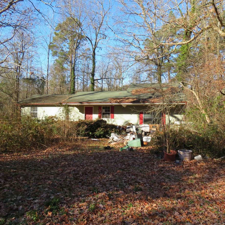 Taxes are with homestead credit.  Large house designed for entertaining. sunken den with spiral staircase leading to a loft overlooking the den with lots of large windows for natural light.