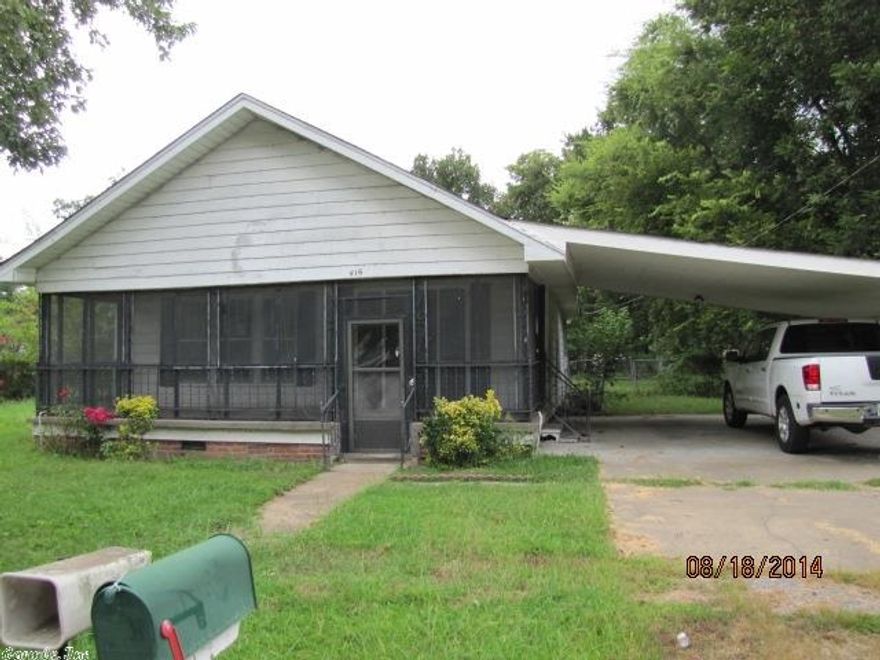 Super value on this solid old house in Lepanto! 1288 sq. ft. with two bedrooms and two full baths. Kitchen with eat in breakfast area, but also has formal dining room. Large glassed in front porch. Central HVAC. Two car carport and large 0.34 acre lot with storage buildings. Property is being sold "as-is" and is subject to HUD guidelines 24 CFR 206.125.