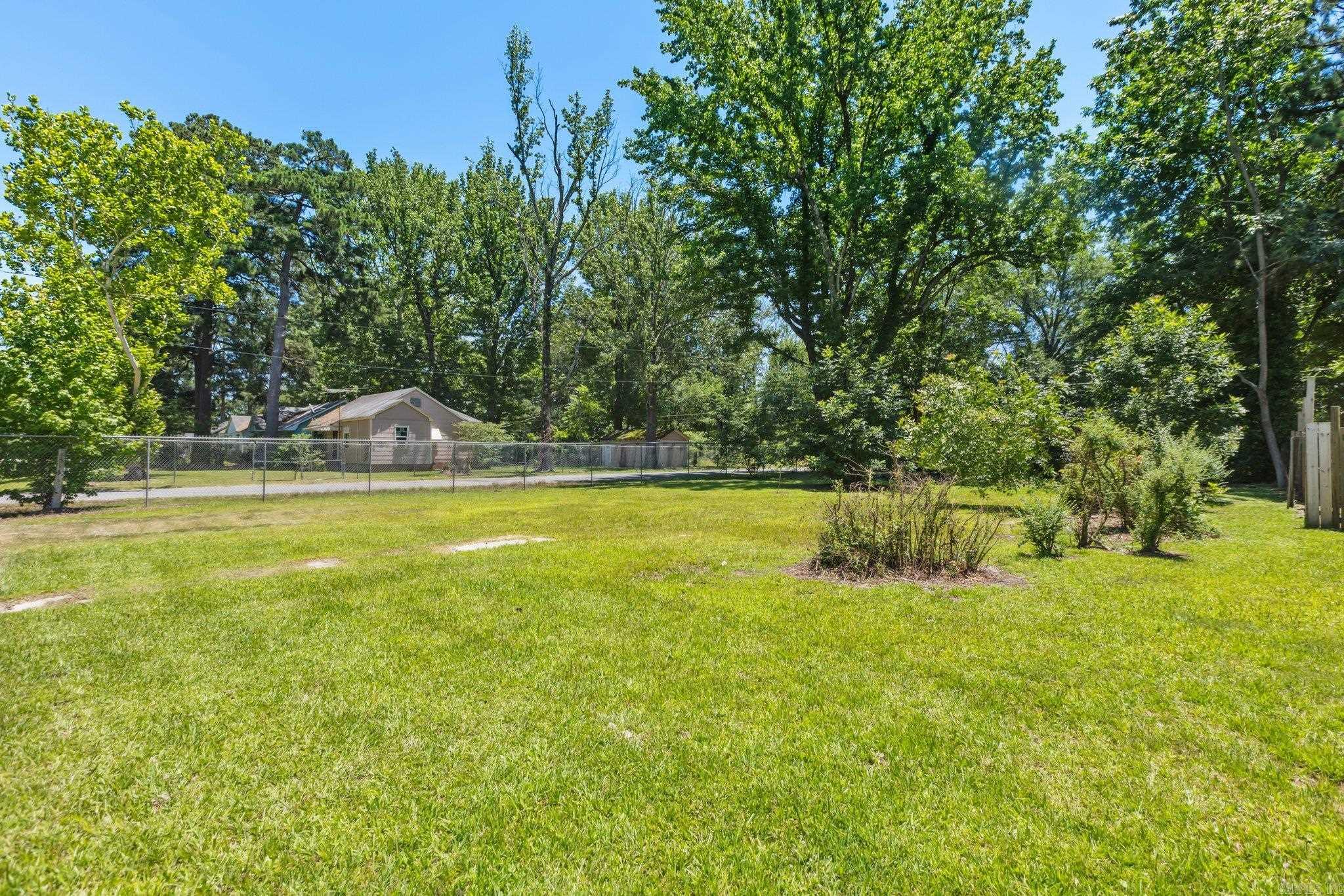 A fenced vacant corner lot with .21 acre ready for your new construction. Less than 2 minutes from Southeast Arkansas College this property is a must see. Sold "As Is". Agents please review agent remarks.