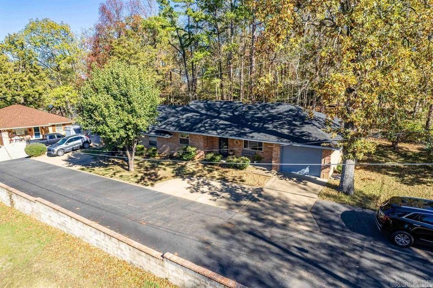 What an awesome property with so many options!  Duplex with both sides for sale! Updated duplex just off the lake that could be an investment property, primary on one side and investment on the other side or primary on one side and in-law quarters on the other side - you decide! The duplex is all brick with a small, fenced backyard and each side has a 1 car garage with storage area.  Both units are 2 bedrooms/1 bathroom and 1,073 square feet with a new roof.  Unit 777 was updated in 2016 with new paint & hardwood floors, updated shower/tub, new HVAC and new kitchen appliances.   This unit also boasts a private side patio.  Unit 779 was updated in 2022 with new paint and floors, dishwasher and bathroom vanity.  This property is located in an area close to Lake Hamilton and there are both on lake and off lake homes in the area,    Schedule your private tour of this property today!