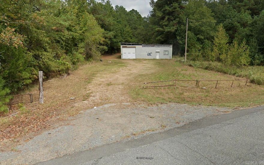 Located on approximately 1.25 acres with highway frontage, this property offers excellent visibility and access for a wide range of commercial uses. Conveniently situated less than 1/2 mile from the busy intersection of Hwy 167 & Hwy 79, this location provides steady traffic flow and strong business potential. The property includes a building that will require repairs, making it a great opportunity for investors or business owners looking to renovate and customize to fit their needs.