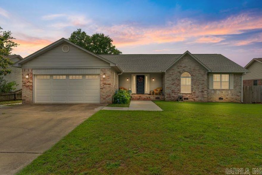 Welcome to this charming newly remodeled home nestled in a quiet, family friendly neighborhood on the West Side of town. This home offers inviting curb appeal to the warm updated interiors, this home is the perfect blend of comfort and style. Step inside to the spacious living room with the elegant wood-like ceramic tile flooring, vaulted ceilings, and a classic fireplace as the focal point-perfect for relaxing evenings alone, with your family  or entertaining guests. Abundant natural light filters through the large windows, enhancing the bright and airy atmosphere. The kitchen is a true showstopper featuring two-toned cabinetry with sleek navy lower cabinets and crisp white uppers, complemented by gorgeous granite counter tops and a subway tile backsplash. A large layout provides ample counter space, making this kitchen both stylish and functional. Outside, enjoy a beautifully landscaped front yard and a wide driveway leading to a two-car garage. The charming front porch is the perfect spot to unwind with morning coffee or some sweet tea in the evening. The backyard has two decks and a new storage building. Also the roof is only four years old! Schedule a showing today!