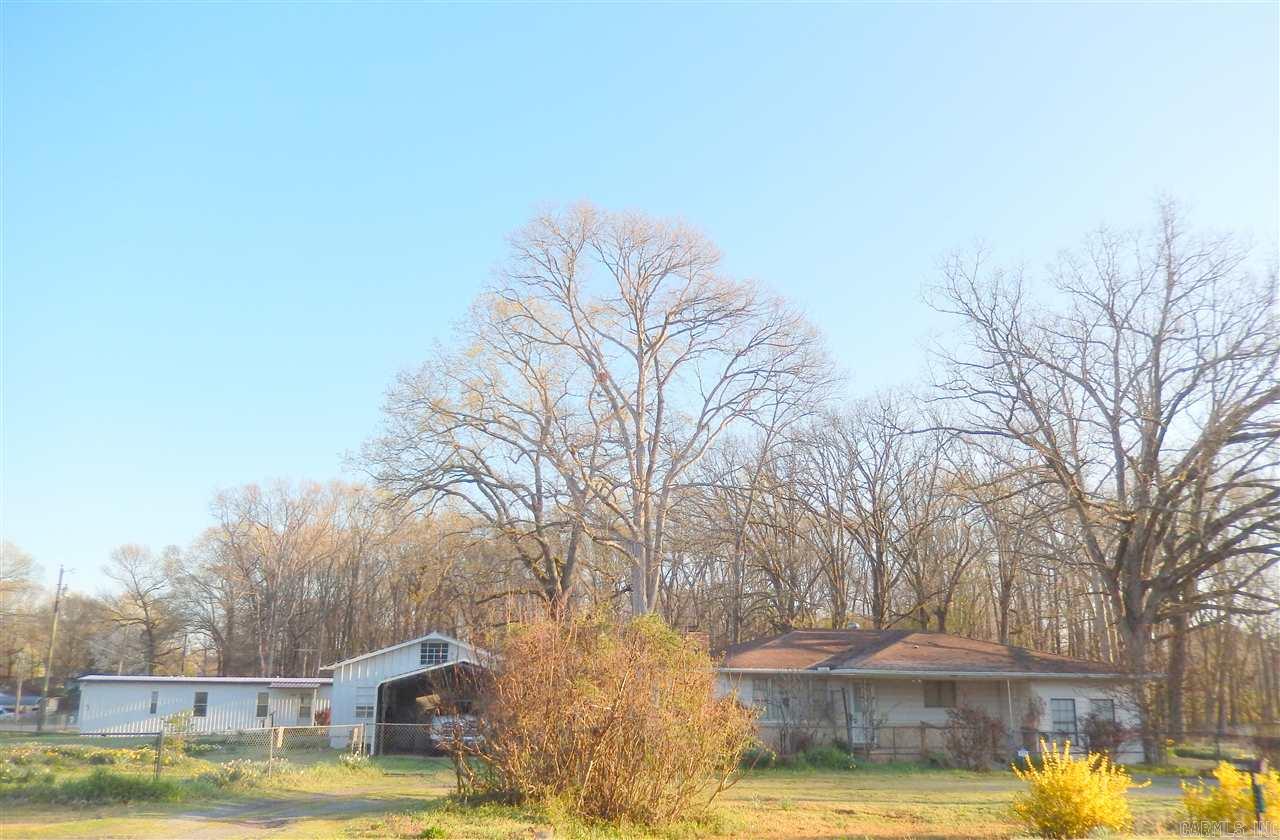 Come see this home that sits on .87 acres just minutes from the air base, restaurants, shopping, and schools. Perfect home for an investment property. 2 Living areas, large kitchen with a lot of cabinets. Multiple out buildings on the property. See agent remarks.