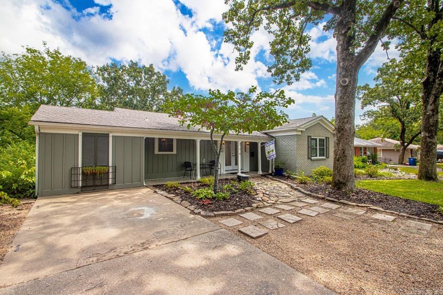 You will find this charming 3-bedroom, 2-bathroom home located on a spacious lot in the highly sought after Historic Park Hill subdivision. The large den welcomes you with beautifully restored original hardwood floors, and adjacent french doors leading out to a newly renovated deck with  lake view during the winter and a spacious patio underneath. The kitchen/dining room combo allows for a comfortable floor plan with upgrades including a new gas stove, tile flooring, granite countertops and new finishes throughout. The new A/C unit replaced in July 2022 will keep your family cool on these hot summer days and the bonus room/office off of the kitchen provides a cozy retreat to serve any family or lifestyle needs.  With beautiful landscaping, fresh paint inside and out, a private master suite complete with fireplace, luxury vinyl flooring, and en-suite washer and dryer, this home is move in ready and excited to welcome you home! " See Agent Remarks"