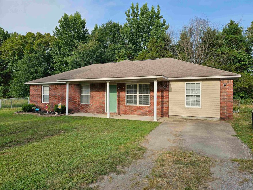 PRICE IMPROVEMENT! BOOK A TOUR TODAY!! Welcome to this cozy home nestled in the heart of Ozark. This inviting residence features a beautiful accent wall with an electric fireplace, creating a warm and welcoming atmosphere in the living area. The home boasts three spacious bedrooms and two full bathrooms, offering plenty of space for comfortable living. An additional room, currently set up as a workout area, provides versatility for your needs. Outside, you'll find a fenced backyard, perfect for enjoying the outdoors and keeping your furry family pets protected. The home's central location ensures easy access to all the amenities and attractions Ozark has to offer. Whether you're relaxing indoors or spending time outside, this charming home offers a wonderful living experience.