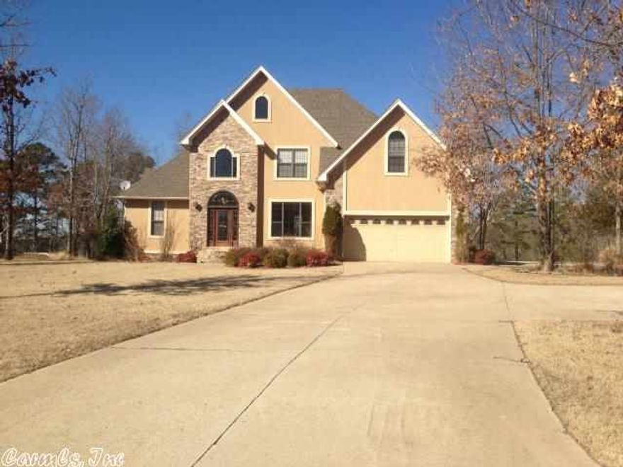 Custom built lake front home with good white line and path and steps to the lake. large multi-level decks, beautiful landscaping and lawn, storm cellar, fireplace,vaulted ceiling family room, Thurmatru defense exterior doors, master has jetted tub and separate shower, boat launch in the sudivision