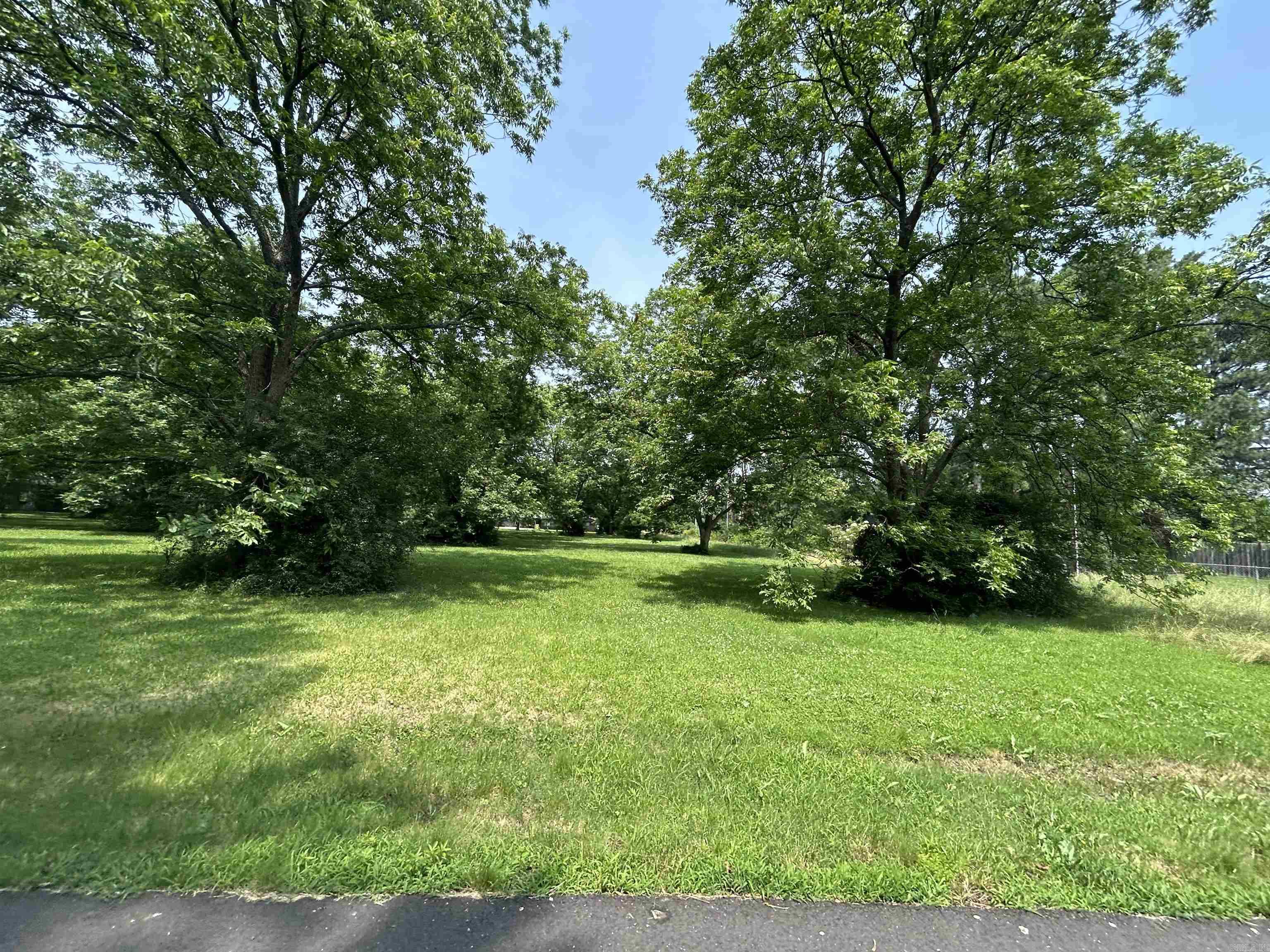 Have you been considering building a home in Stuttgart, or maybe investing in a lot to develop a residential property? This may be the one for you! This Lot will be offered alongside 8 others in Block L of the Crescent Hill Subdivision. Each lot is home to one or more beautiful, mature pecan tree(s) and utilities are conveniently available at the street. The property has been recently surveyed and is waiting for you to bring your vision to life!