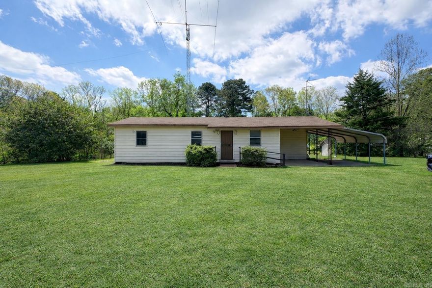 Unlock the potential of this 2 bedroom, 1 bathroom home nestled on 0.7 acres in rural South Little Rock. With a newer roof (2022) and original hardwood floors in impressive condition, this property is a perfect canvas for your next project. The level front yard and additional storage shed provide added value, while the setting offers space and privacy. Ideal for investors or renovators ready to bring new life to this home. Sold as-is.