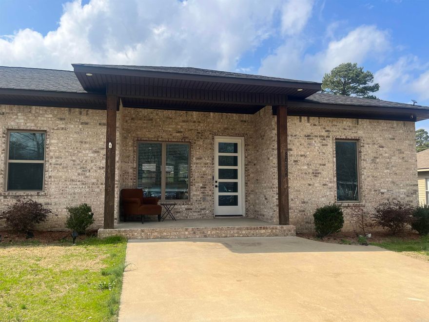 Like-new all brick duplex built in 2019. Each side is identical with 3 bedrooms and 2 full baths. Primary suite is separate from other two bedrooms. Each side has lovely stained concrete floors throughout (no carpet!) and tall 10' ceilings and are both all electric energy efficient. Living room opens to dine-in area into kitchen with large island w/ barstool seating, granite counters, built-in microwave with stainless appliances and separate pantry. Full laundry is off kitchen. Large flat backyard with patio area. Refrigerators stay. Washer and dryers do not.