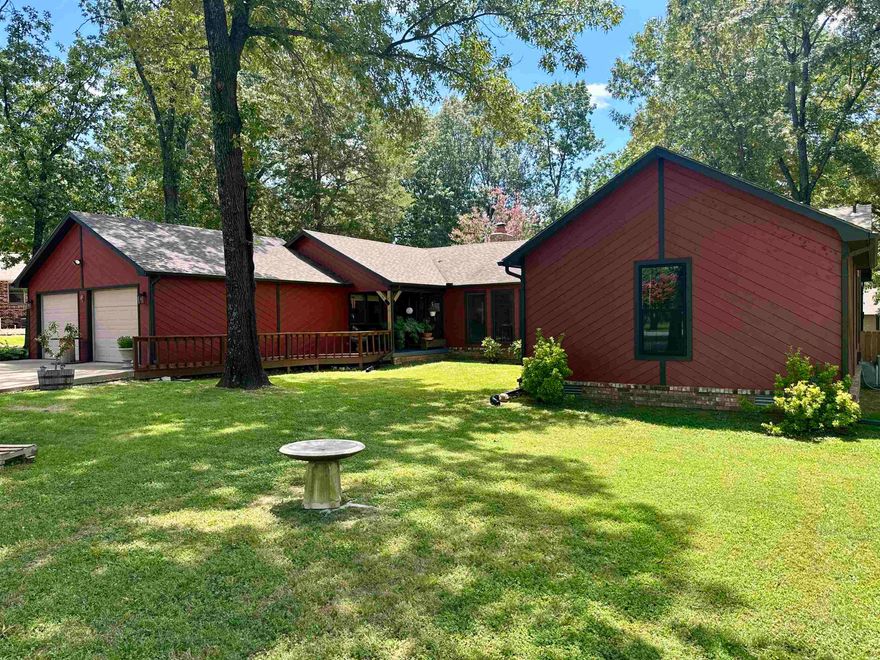 Welcome to this beautifully updated 4-bedroom, 2.5-bath home located in the desirable Northern Hills neighborhood of Mountain Home, AR. Sitting on a generous 0.71-acre lot, this 2,500 sq ft home features an open floor plan with brand-new luxury vinyl plank flooring throughout the main living spaces. The updated kitchen boasts granite countertops, newer appliances, and modern finishes—perfect for everyday living and entertaining. All bathrooms have been refreshed with contemporary touches, creating a clean, modern feel throughout the home.  Step outside to a spacious backyard complete with a new wood privacy fence and a huge, updated deck ideal for relaxing or hosting. The home's exterior showcases restored cedar wood siding, adding charm and curb appeal. Ideally located in town, you're just minutes from medical facilities, shopping, dining, and the beautiful Norfork Lake. This home offers the perfect combination of style, space, and convenience—move-in ready and waiting for you to make it your own.