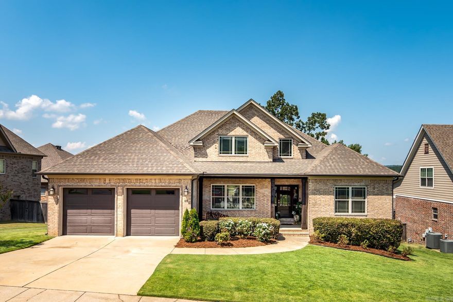 Wonderful one-level custom home with the perfect floor plan, great views and beautiful custom finishes. The entry opens to a dining room, great room with a  wood burning fireplace and chef's kitchen. The primary bedroom suite apart w/ fabulous bath & closet. This open floor plan offers gorgeous hardwoods, quartz countertops, stainless appliances, beautiful crown moldings plus more! Covered deck & fully wood fenced yard w/tons of storage under house accessed by a garage door for ease. New roof 2019, new dishwasher 2022, new refrigerator 2022.