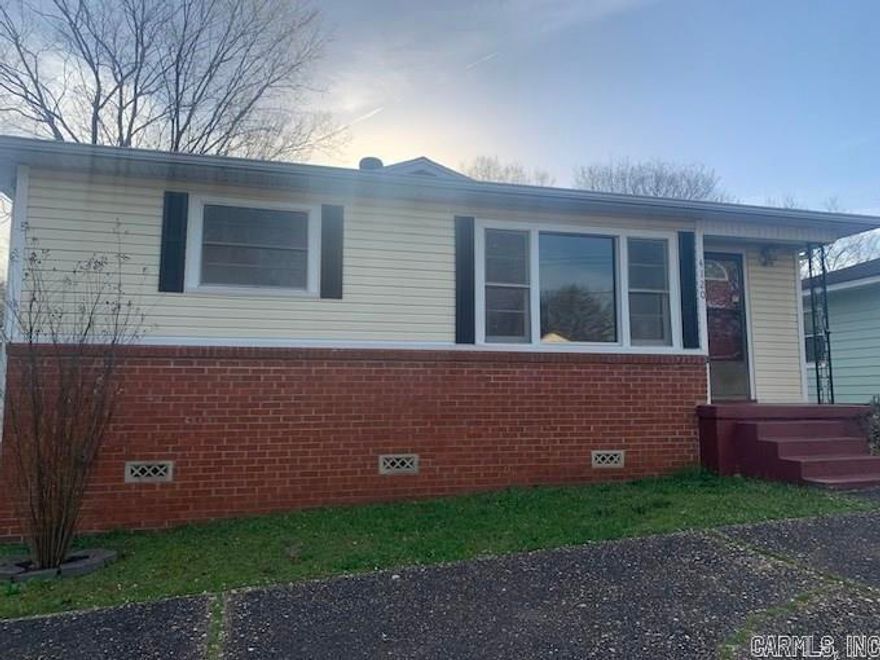 Brick and siding home, great condition, has two living areas, three bedrooms and two baths, laundry room, cabinet filled kitchen with eating area. family room with fireplace. Massive 800 sq.ft. garage, workshop, two over head doors, one in front and one in back. perfect for vehicle and shop. One year rental agreement preferred.