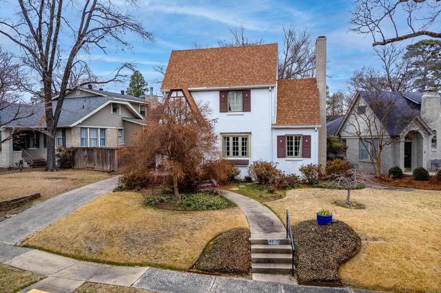 Timeless character meets classic Heights charm define this exceptional 1927 stucco Tudor, offering approximately 2,393 square feet of thoughtfully layered living space in one of Little Rock’s most established neighborhoods. From its distinctive façade to its classic proportions, this home reflects the enduring craftsmanship & architectural presence that simply cannot be replicated today. The residence unfolds over multiple levels, creating both intimacy & flexibility. The second level hosts three bedrooms & two full baths, providing a private and comfortable retreat. A third-story bonus room offers endless possibilities; an executive home office, creative studio, or secluded guest space. Original character & period charm are woven throughout with a layout that accommodates modern living. A detached two-car garage adds both convenience and functionality, complementing the home’s architectural integrity. Set on picturesque Crestwood Drive, this Tudor stands as a rare offering; a home with presence, history, & refinement. Ideal for buyers who value architectural distinction, layered living spaces, and the quiet luxury of a residence that has gracefully withstood the test of time.