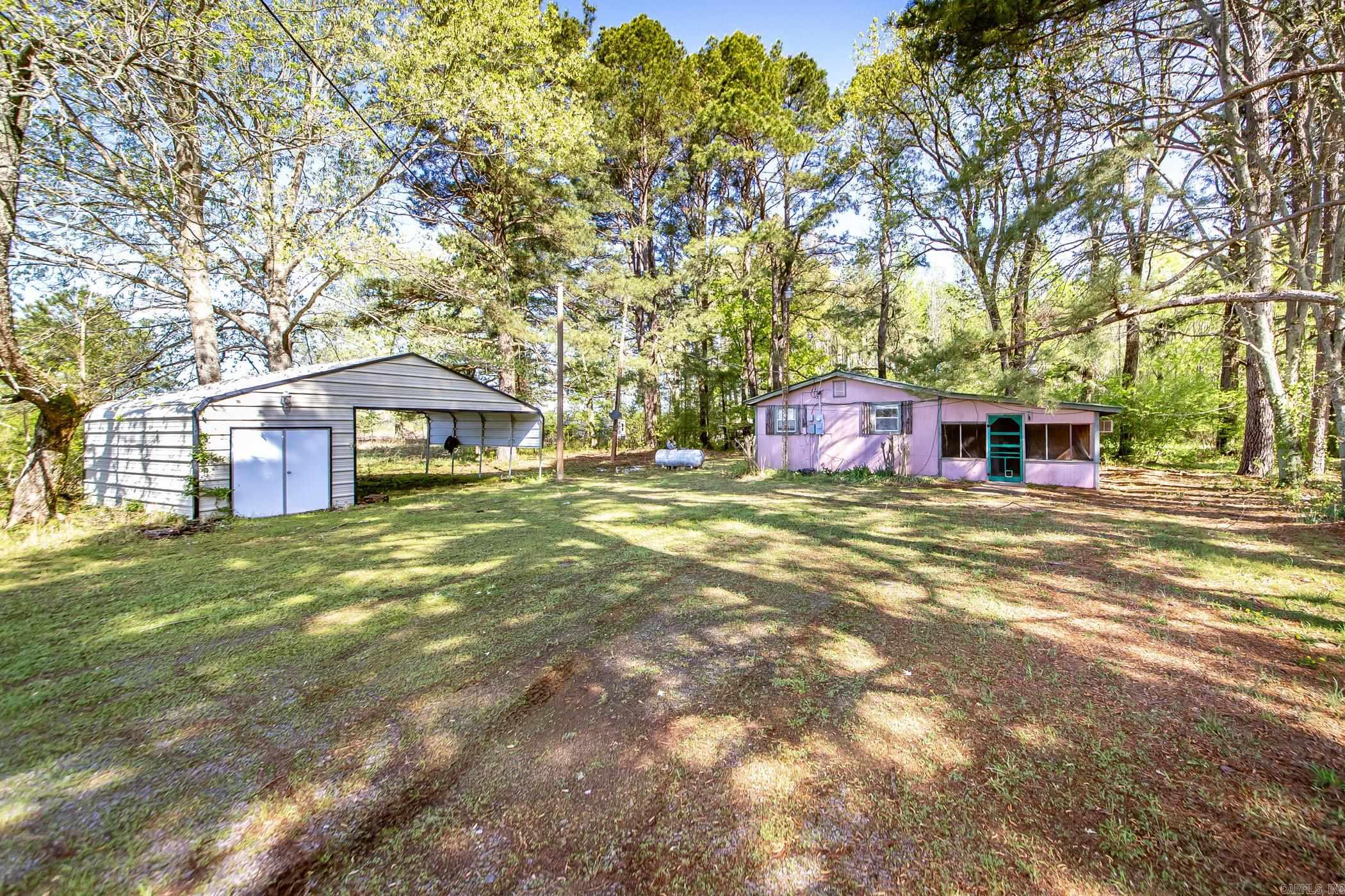 ATTENTION HUNTERS!! This fixer upper is just 1/2 mile from Mitchel's corner, and across the street from Henry Gray Wildlife Management Area (Hurricane Lake). Brand new survey, and NO RESTRICTIONS! Perfect location for a hunting property, or a peaceful home with gorgeous views! Call today to set up a showing! **Trailer is being removed off the property**