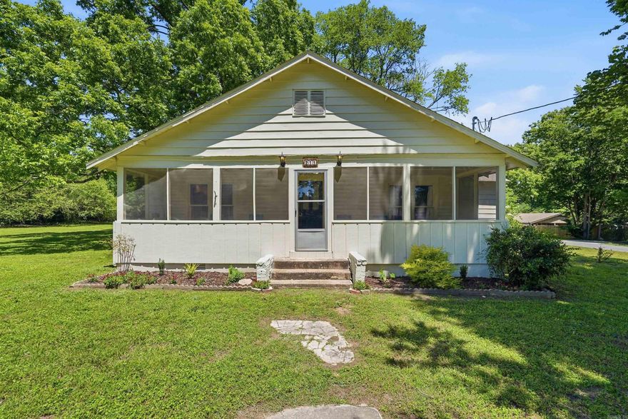 Charming updates meet timeless character at 211 NE 3rd Street in Bryant! This spacious home sits on a huge lot and features a blend of original wood flooring and luxury vinyl throughout. Full Renovation completed in the past three years. Major improvements include a newer HVAC system, tankless water heater, custom tiled shower, updated plumbing, electrical, and fresh paint. The roof is approximately 6–8 years old. The barn in the back yard has endless possibility: from a detached living space, to workshop, or remote office. Enjoy relaxing mornings or entertaining evenings on the screened-in porch. Conveniently located near schools, shopping, and dining, this property offers comfort, charm, and room to spread out both inside and out!