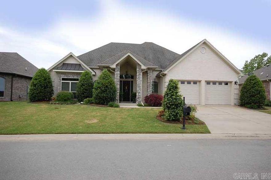 Executive home in a Country Club setting! This immaculte home is perfect! High ceilings, dripping with crown molding, beautiful columns, huge rooms and a great kitchen. Awesome hard wood floors, solid surface counter tops and tons of cabinets!  Formal dining room and office! The back has a screen in porch and backs up to the woods! This home has is all. The POA covers the yard maintance!  Never mow your yard again! Call today so you don't miss this great home!