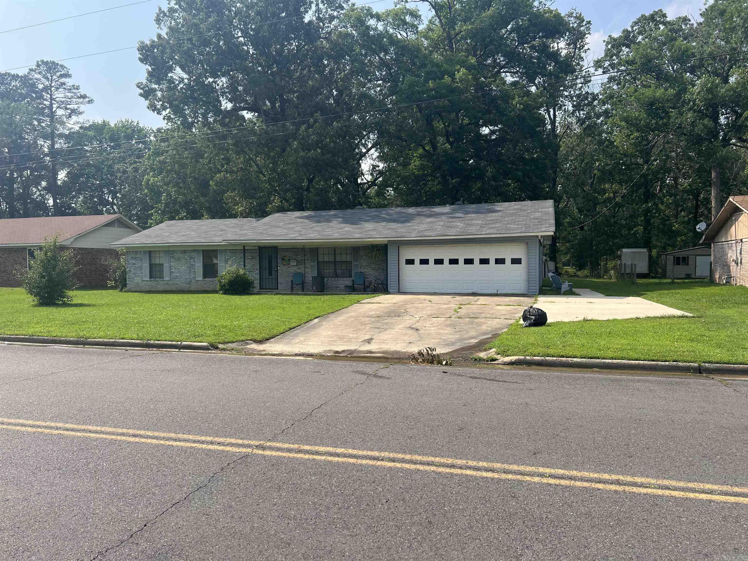 3 bedroom 2 bath home in East Camden/Harmony Grove School District. Updates - 2023 Paint - 2022 Walkway and parking pad - 2022 light fixtures in living room, bonus room, primary bedroom, dining area will be replaced. Window coverings do not remain. Ring and alarm system will not remain.