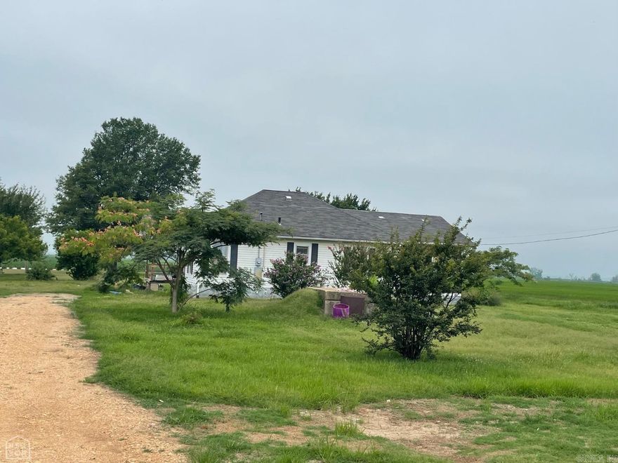 Attention all investors! 3 beds and 1 bath sitting on 1 acre of land in Jonesboro. Storm shelter. Bay Public Schools. Selling "AS IS, WHERE IS".