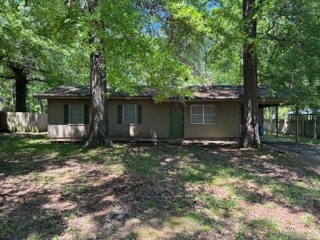 Great Investment opportunity. Nice shady, level lot on the edge of town close to schools and shopping. This home can be bought separately or in a package deal with two other homes. Agents see Remarks