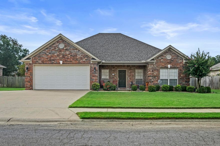 Beautiful, Traditional All-Brick Home in the highly sought-after Krooked Kreek neighborhood! This 3-bedroom, 2-bath home offers a spacious & functional split floor plan with a Large Great Room featuring beautiful Wood Like Tile Flooring & Cozy Fireplace. The Kitchen Highlights are the Large Island with B'fast Bar, Stainless Appliances, Pantry, Built-in Desk area & the large separate Dining Room ;perfect for entertaining a crowd! The Primary Suite is generously sized with Tray Ceilings, built-in bookshelves, and a Private Bath complete with HIS/HER Closets, Jacuzzi Tub, and New Separate Shower Professionally updated in 2024! Both Spare Rooms are Large and Hall Bath Features a Large vanity area with a Linen Tower. Tons of Natural Light, lots of storage throughout, & Nice Laundry with folding counter. Enjoy sipping coffee on your covered back patio swing with extended patio space, large fenced backyard complete with a small dog run, two storage buildings, & small garden area with raised flower beds. Other features include French Drains, Driveway extension and the roof was replaced in 2022! Great neighborhood close to parks & amenities in the Cabot School District! Check out the video!