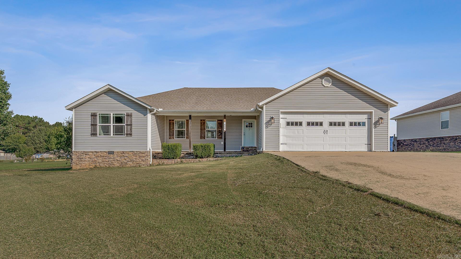 OPEN HOUSE SUNDAY OCTOBER 12th 1:30-3:00 This home features a spacious open-concept layout, perfect for hosting or relaxing with family. The living area opens to a back deck and large fully fenced yard, ideal for cookouts or outdoor fun. Inside, you’ll find 4 bedrooms with generous closets, including a primary suite with double vanity, and a soaking tub. A brand-new roof is on the way, and the HVAC is just a year old offering both comfort and peace of mind.
