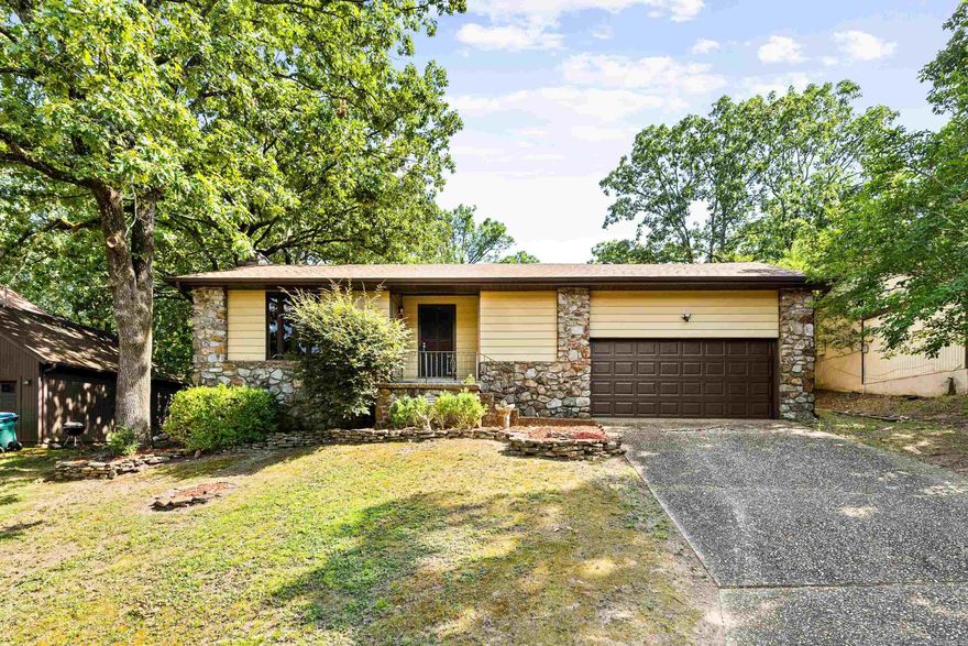 Welcome to your new home in West Little Rock! This charming three-bedroom, two-bathroom residence showcases tasteful updates throughout, including custom tile showers and granite countertops in both bathrooms, and ceramic tile floors. The living room features a stunning stone fireplace and a cathedral ceiling with built-in shelving, while the kitchen boasts newer appliances, a gas range, and a spacious breakfast area. Adjacent to the kitchen, a versatile office/sunroom flooded with natural light offers flexibility for work or relaxation. The indoor laundry room includes a washer, dryer, and a deep freezer that stays with the home. Outside, enjoy the fully fenced backyard with a covered deck and grilling patio, perfect for outdoor gatherings. Additional amenities include a two-car garage and a prime location close to restaurants and shopping. Don't miss out on this meticulously maintained home that combines comfort, style, and convenience in one of West Little Rock's best neighborhoods!