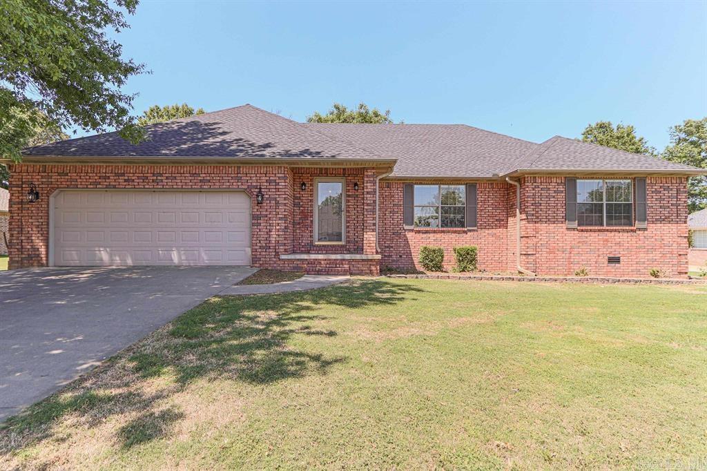 This is a beautiful 3 bedroom, 2 bath home located in Carriage Hills on the south side of Paragould. The all brick exterior and fenced backyard provide a sense of privacy and security. The large deck is perfect for grilling and outdoor entertaining. The oversized garage and crawl space provide ample storage space. The LVP and tile flooring in the common areas and carpet in the bedrooms are both practical and stylish. The vaulted and decorative ceilings add a touch of elegance. The large laundry room is convenient for everyday use. The huge primary bedroom with whirlpool tub and shower is a luxurious retreat. Don't miss out on this wonderful home!