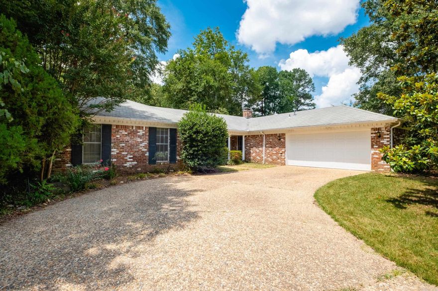Single level brick home at the end of a wonderful cul-de-sac in Leawood. There are wood floors throughout the home, 2 living areas, large kitchen, brick fireplace in the den. Huge yard backing to the woods. There are 3 spacious bedrooms all with walk-in closets. 2 1/2 Bathrooms. There are french doors from the living room to the patio. There is a side patio off the laundry room. Some of the windows have been replaced.