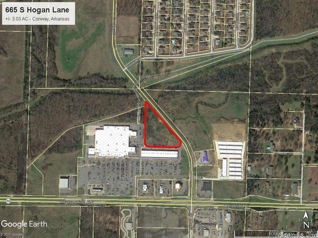 PRIME COMMERCIAL PROPERTY with great development potential. This 3.03 acre parcel of land is located in Conway Marketplace shopping center adjacent to Walmart and other retailers. It features road frontage with excellent visibility in a high growth area of western Conway. Mineral Rights do not convey.