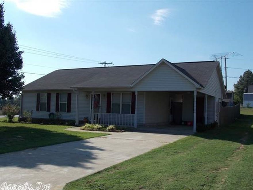 Adorable updated home on large corner lot with large yard, privacy fenced, 2 storage buildings.  3 bedrooms with split type baths, great floor plan, wood laminate flooring, modern paint and decor, tiled kitchen/breakfast area, tiled backsplash, ceiling fans, security system. don't miss this one! Agents see remarks.