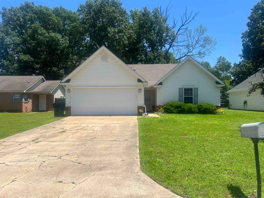 Welcome to this beautifully maintained 3-bedroom, 2-bathroom traditional home offering comfort, style, and convenience in a cozy 1,057 sqft layout. Situated on a spacious 0.19-acre lot, this property features vaulted ceilings that enhance the open feel, landscaped front yard, and a chain-link fenced back yard perfect for pets or play. Recent upgrades include a new roof and water heater (2023), giving peace of mind for years to come. Enjoy the convenience of an attached garage for parking or additional storage. Whether you're a first-time buyer or looking to downsize, this home is move-in ready and full of charm. Don't miss the opportunity to own a well-cared-for home with modern improvements in a desirable neighborhood!