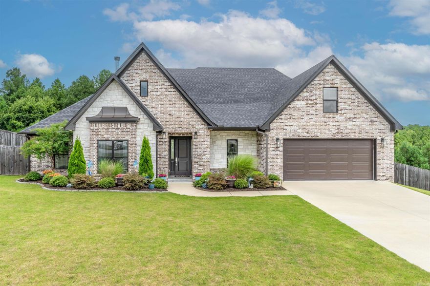 STUNNING is an understatement on the Beauty! 9096 Stone Canyon Drive is PERFECT for any family! Offering 5 bedrooms, 2 & 1/2 Baths, 2676 sqft, & 1.22 ACRES! There's plenty of space for everyone! Open Concept for full family entertainment! Whole house is freshly painted, Cabinets & all! New Kitchen backsplash! Gorgeous Granite countertops throughout! Entry Foyer with a beautiful barrel ceiling! Separate primary with large en suite! Soaker tub, & tiled Walk-in shower! Large primary closet as well! Kitchen offers double ovens & large butler's pantry!  Bonus room upstairs could be considered 5th bedroom or extra game room for the kids!  Nice Covered patio out back for enjoying time outdoors! All Brick Exterior! Back half of the property is Green space and also Easy to clear if you wanted more of a backyard!! Double gated fence! No neighbors behind you! Come see this one today! SEE AGENT REMARKS!