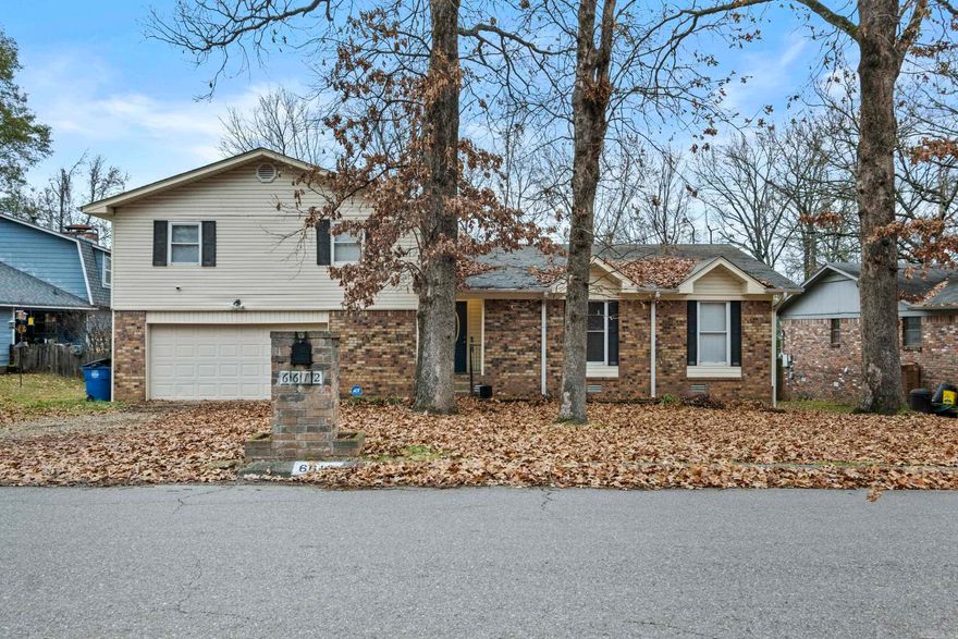 This Beautiful Home features a Large Den w/ Fireplace, formal living room on main level, and a large bonus room downstairs! (Could easily be a 4TH BEDROOM) The square footage is marvelous! The nice kitchen is loaded with counter top space, and lots of cabinets! The Breakfast Nook features a bar with seating, and a bay window overlooking the backyard! And, it also has a formal dining room! The floors are newer-this home is move-in ready! Roof replaced in 2020! Dishwasher, Water heater and Electrical box replaced in the past 3 years! It also features a large back yard, and 2 decks for entertaining/family time! Walking Trail is located behind the home! Close to Restaurants, Shopping and Schools! This one has it all!