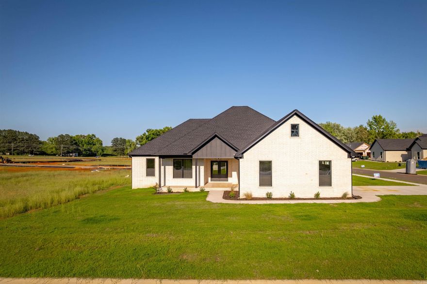 Welcome to crisp style and blended elegance in this 2025 New Construction Home in Cabot! Entering the home thru large French doors you step into the foyer greeted by the spacious living room accenting the ultra-open concept of this stunning home! You instantly notice the planning & detail that went into styling this home. The large kitchen bar top island allows for entertaining guests and convenient family nights & notice the accented cabinet paint too! This kitchen has ample cabinetry & storage, a tile backsplash, stainless appliances and more! Just off the kitchen is the dining room. This home boasts a split floor plan with 3 guest bedrooms on the left and the master bedroom and bath on the right. Do not miss the walk thru connection from garage entryway into the laundry room that also connects to the master bath area too! Enjoy covered front porch time with this home too! has tile and luxury vinyl & hybrid laminate throughout the home. PS...Checkout those living room ceiling and fireplace accents! Bam! Also, Seller is offering $5K in Buyers Concessions too so do not delay! Projected equity in the home so discuss options if interested in a fence or other too! See Agent Remarks.