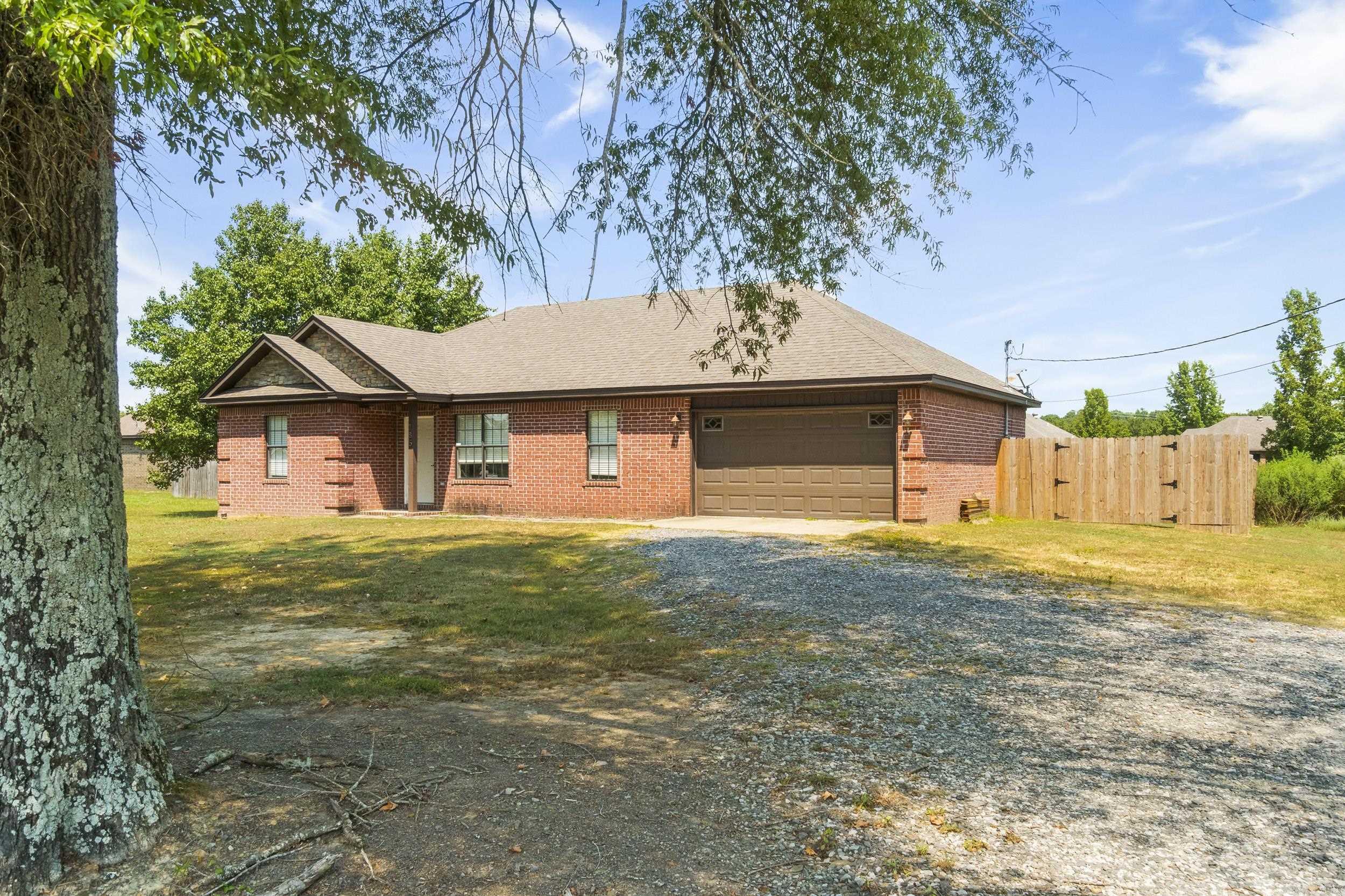 Welcome to this rare find! A 3-bedroom, 2-bathroom home that has been thoughtfully updated and lovingly maintained. Outside of city limits of Searcy, this property gives you the best of both worlds: the peace of country living with quick access to town. Inside, you’ll immediately feel at home with the bright, open spaces filled with natural light. The kitchen has been updated with modern touches that make cooking and gathering a joy, while both bathrooms have been refreshed for comfort and style. Each bedroom offers good-sized closets complete with built-ins, giving you plenty of practical storage without sacrificing charm. New heat/air unit and new hot water heater in 2022. The home sits on a slab foundation, adding peace of mind and low-maintenance living. Step outside to find a large fenced-in backyard, the perfect spot for pets, play, or evenings spent unwinding. An attached garage adds extra convenience, and the updates throughout mean you can move right in and start enjoying your new home. Homes like this don’t come around often... rare, well-maintained, and move-in ready.