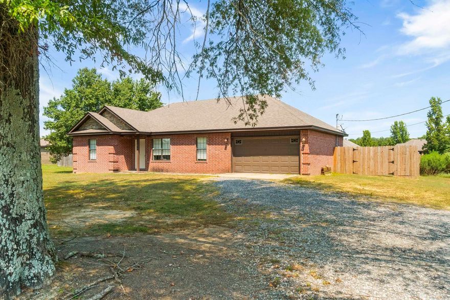 Welcome to this rare find! A 3-bedroom, 2-bathroom home that has been thoughtfully updated and lovingly maintained. Outside of city limits of Searcy, this property gives you the best of both worlds: the peace of country living with quick access to town. Inside, you’ll immediately feel at home with the bright, open spaces filled with natural light. The kitchen has been updated with modern touches that make cooking and gathering a joy, while both bathrooms have been refreshed for comfort and style. Each bedroom offers good-sized closets complete with built-ins, giving you plenty of practical storage without sacrificing charm. New heat/air unit and new hot water heater in 2022.  The home sits on a slab foundation, adding peace of mind and low-maintenance living. Step outside to find a large fenced-in backyard, the perfect spot for pets, play, or evenings spent unwinding. An attached garage adds extra convenience, and the updates throughout mean you can move right in and start enjoying your new home. Homes like this don’t come around often... rare, well-maintained, and move-in ready.