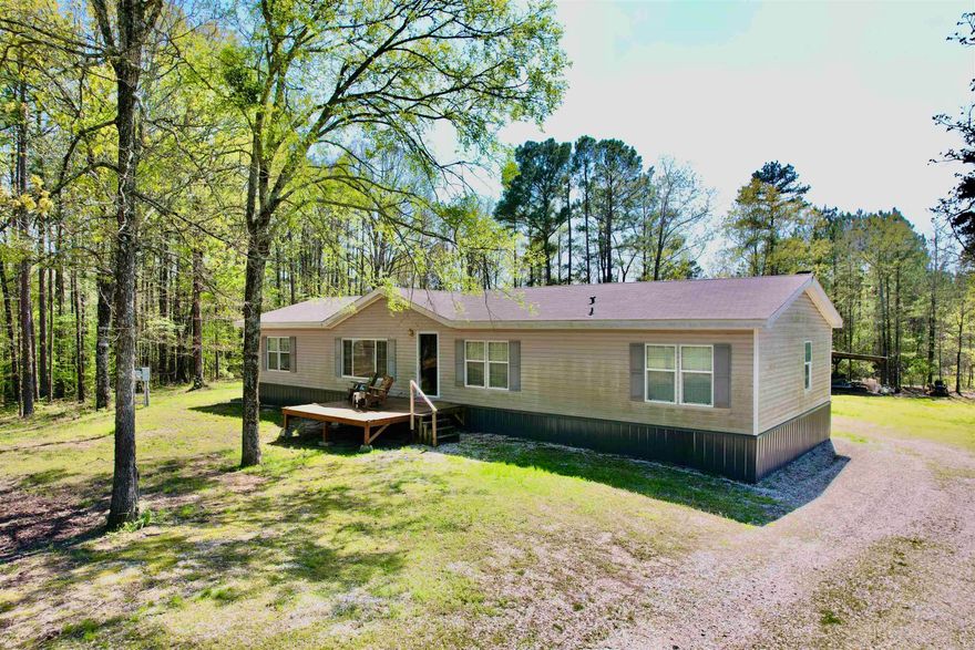 Welcome to 146 Foxbrook Court, a serene retreat nestled at the end of a cul-de-sac in Pearcy, Arkansas. This charming property offers a unique blend of comfort and tranquility, perfect for those seeking a peaceful lifestyle. Situated on a generous 3.17-acre lot, this home provides ample space for outdoor activities and relaxation. The expansive grounds are complemented by an above-ground pool, inviting you to cool off during warm Arkansas summers. Adjacent to the pool, the covered back deck serves as an ideal spot for entertaining guests or simply unwinding while soaking in the picturesque surroundings. Inside, the residence features a thoughtfully designed layout that maximizes both space and functionality. The kitchen offers a streamlined cooking experience with plenty of counter space and storage. The surrounding countryside offers a peaceful ambiance while still being conveniently close to local amenities and attractions. Experience the perfect blend of rural charm and modern conveniences at 146 Foxbrook Court—a place to call home.  Agents see remarks