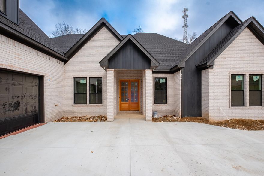 This stunning custom-built home never even hit the market! Featuring 5 bedrooms, 3 bathrooms, and 2,663 square feet, this thoughtfully designed property blends luxury, space, and functionality in one of Hot Springs’ most desirable communities.  From the moment you step inside, you’ll notice the beautiful vaulted and tray ceilings that add character and architectural interest throughout. The expansive primary suite is a true retreat, complete with a spa-inspired bathroom and a private layout separate from the additional bedrooms for ultimate comfort and privacy.  On the opposite side of the home, you’ll find three generously sized bedrooms, perfect for family, guests, or office space. Above the garage, a versatile bonus room offers endless possibilities — ideal as a fifth bedroom, media room, playroom, or flex space tailored to your needs.  Located in the highly sought-after Eagle Rock Subdivision, this home offers the best of both worlds — a peaceful, country-style setting just minutes from the bypass and everything Hot Springs has to offer. Residents enjoy exceptional neighborhood amenities including a community pool, playground, pavilion, and green space.