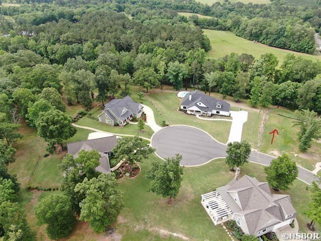 One of the last available lots in Arkota Shores. And this one is ready and available for you! A convenient sidewalk leads you to the community arbor, which is right on the shores of Lake Hamilton. Minimum square footage for your new home is 1800. Utilities are available and in place. Make plans to visit this gated community and see for yourself why this is where you want to live!!