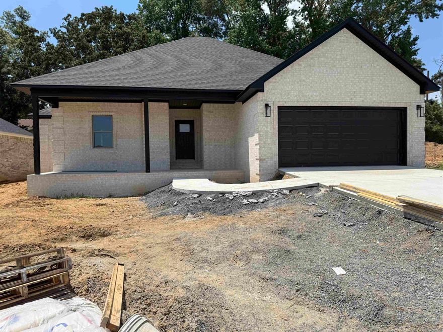 Beautiful New home under construction lots of attention to details very open floor plan breakfast bar and center overlook large den with electric heater fireplace Built in the wall wonderful split bedroom floor plan good size kids rooms. Master bedroom was sitting area spa like bath with two closets so clean tub in the center . Large pantry kitchen, large linger room coat, coat rack, and store area inside the garage coming into the house trade ceiling wonderful looking ceiling fan private area close to Little Rock Air Force Base estimated completion August 20