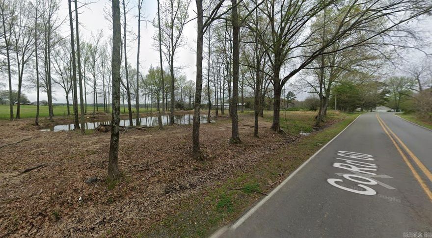 Welcome home to 8623 Centennial Road in Jacksonville.  Just under 3 acres, cleared, with a large pond and utilities, included installed water meter and septic tank. Convenient, yet quiet and peaceful, location less than 30 minutes from downtown Little Rock.  Flat parcel with perfect setting to build your dream home!