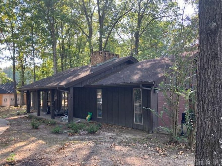 Three bedroom, two bath all electric home on a corner lot with large oak trees. Also included is a 16 X 10 shop building.