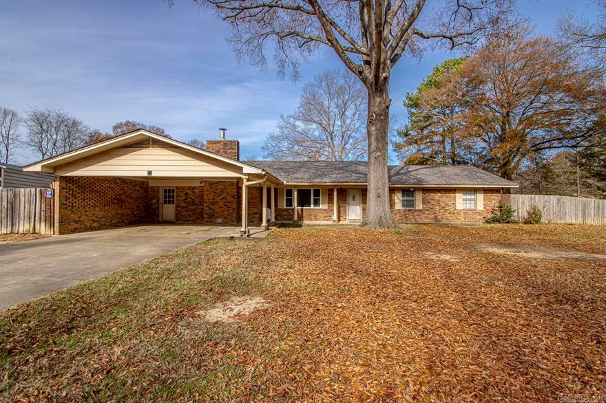 Large beautifully updated 4 bedroom 2.5 bath home (over 2600 square feet)  on a large fenced lot in the city limits of Conway (on Conway Corp).  The kitchen has new cabinets, quartz countertops, farm sink, and marble backsplash.  Lots of new floor coverings throughout.  All bathrooms have been updated.  New roof in 2022.  New water heater 2024.  The home was built with  2 x 6 studs for exterior walls.  There is a heated and cooled 30 x 40 shop with a car lift. It has covered RV parking, outdoor storage, & a storm shelter. Close to the Conway Commons, Target, Sams, Kroger and I-40. 2 Gig Internet available.