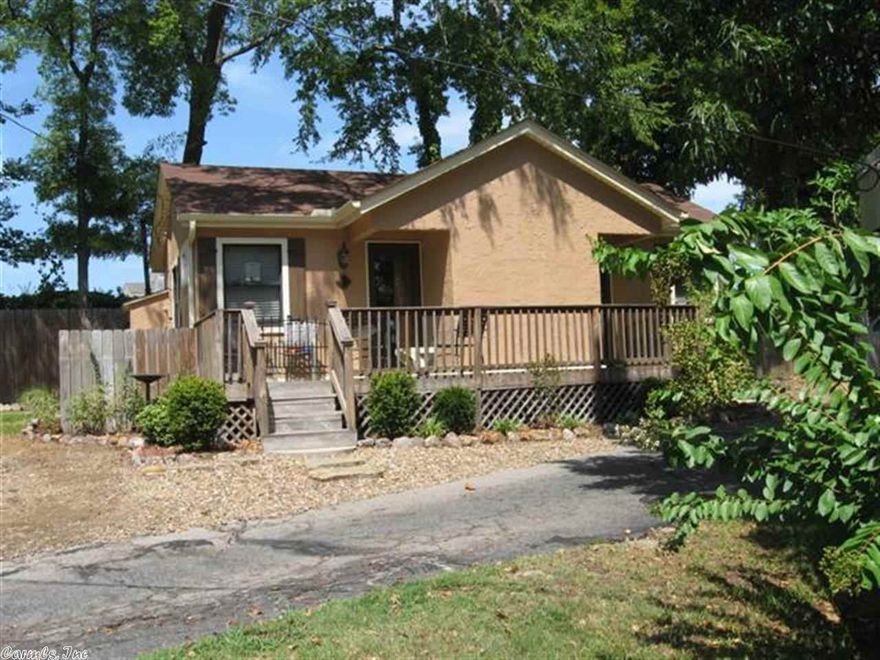 Your ticket to fun on Lake Hamilton.   Gated community.  Recent updates include New Heat and Air (August 2012), crown moulding, doors and updated cabinets and paint.  2 bathrooms and cozy deck.  Located in Hwy 7 South area.  Close to Wal*Mart, Kroger and Hot Springs Mall.  Walk to pool, party room and boat slips.  Condo is assigned 2 covered boat slips.  Low POA dues.  Call agent for showing instructions and more information.